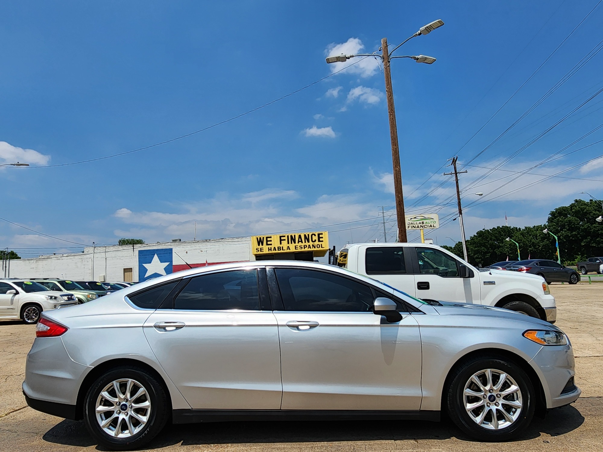 2016 SILVER /GRAY Ford Fusion (3FA6P0G70GR) , located at 2660 S.Garland Avenue, Garland, TX, 75041, (469) 298-3118, 32.885551, -96.655602 - CASH$$$$$ CAR! This is a 2016 FORD FUSION S SEDAN! SUPER CLEAN! BACK UP CAMERA! BLUETOOTH! Come in for a test drive today. We are open from 10am-7pm Monday-Saturday. Call or text us with any questions at 469-202-7468, or email us at dallasautos4less@gmail.com. - Photo #2